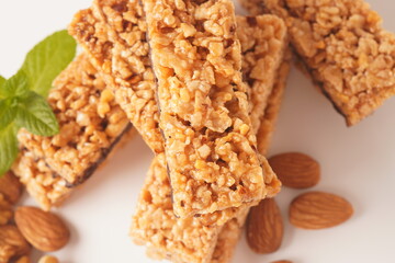 Various healthy granola bars (muesli or cereal bars). Set of energy, sport, breakfast and protein bars. Puffed rice, berries, chocolate, oatmeal, almond and honey cereal bars.