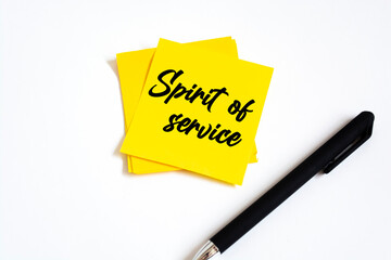 Text spirit of service on the short note texture background