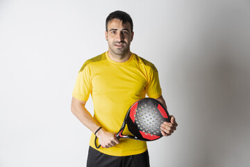 man playing paddle tennis white background