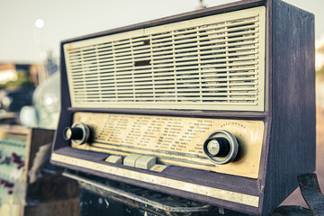 Close up old transistor radio in vintage style.
