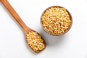 Dried chickpeas in bowl isolated on white background.