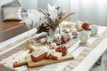 Fresh homemade cakes on a decorated table for Easter.