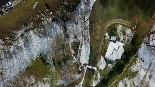 Aerial of Munich - snow in the bavarian city, a look-up shot over the inner city at wintertime in 4K