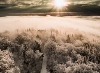 Magnificent view from Watchtower in the mountains during the winter. Land covered by snow, peace in soul during amazing sunset.