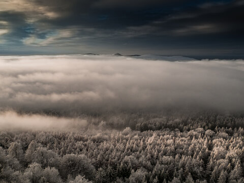 Magnificent view from Watchtower in the mountains during the winter. Land covered by snow, peace in soul during amazing sunset. - Powered by Adobe