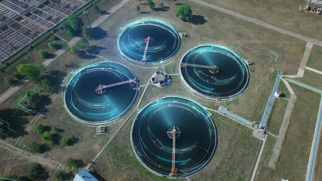 Drone aerial orbit view on water treatment with motion graphics.