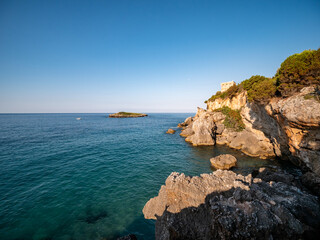 coastal tower and islet on the Tyrrhenian Sea near Marina di Camerota. Cilento, Salerno, Campania, Italy