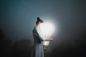 woman confidently embraces one of her creative idea lighting up the night