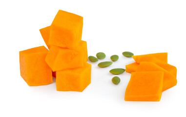Pumpkin pieces cut in a cube chunks  isolated on white background.