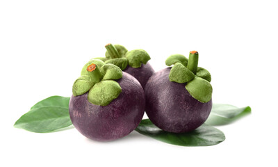Delicious ripe mangosteens and green leaves on white background