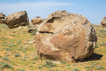 Concretions in Torysh, Western Kazakhstan. Concretion is a spherical mineral aggregate of dense...