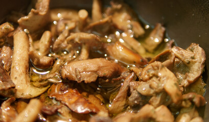 Fototapeta premium detail of mushroom cooked in a pot