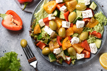 greek vegetable salad with olives on a beautiful plate