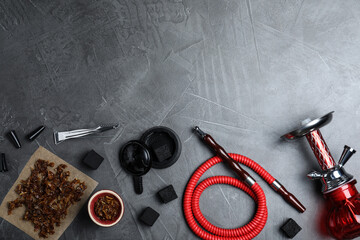 Flat lay composition with parts of hookah on grey table, space for text