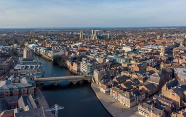 York city centre and York Minster aerial view from over the River Ouse showing bridge and historic...