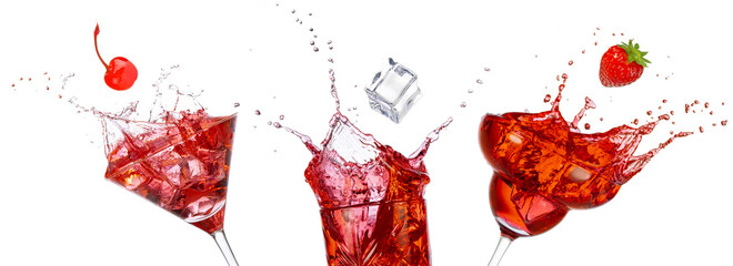 Fruit and ice cube falling into three red cocktails splashing on white background. Drinks collage.