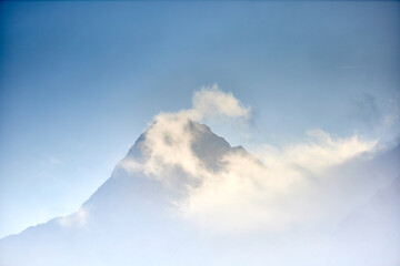Naklejka na ściany i meble background of mountain with white clouds