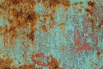 Metal sheet rusty faded texture. Peeling turquoise paint on a concrete wall. Steel plate background.