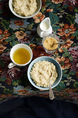 Rice pudding with milk with breakfast table