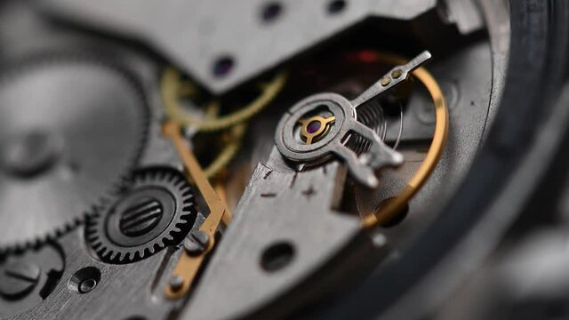 Working gear mechanism of an old wrist watch in macro. Close-up
