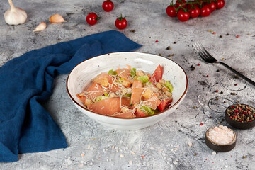 Caesar salad with lightly salted salmon