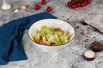 Caesar salad with shrimps and croutons