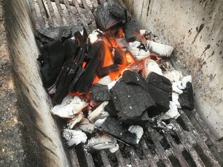 Burning charcoal fire for barbecue