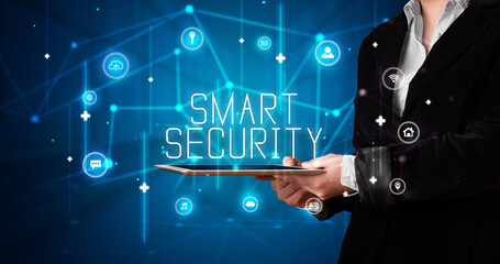 Person holding tablet, security concept