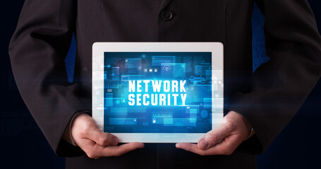 Person holding tablet, security concept