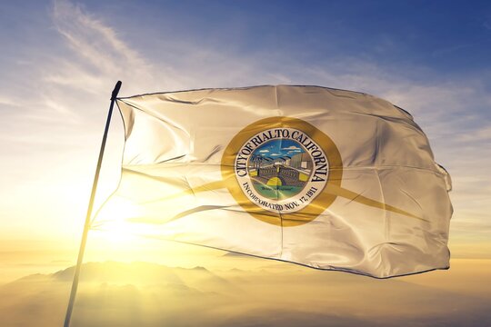 Rialto of California of United States flag waving on the top