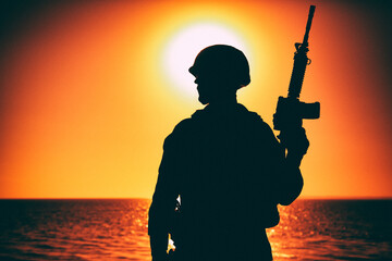 Silhouette of army soldier, special operations forces infantry rifleman, Marines fighter in combat...