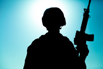 Silhouette of army soldier, special operations forces infantry rifleman, Marines fighter in combat...