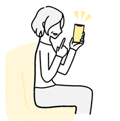 スマホを操作しているシニア女性