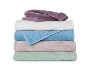 Folded fresh clean towels on white background
