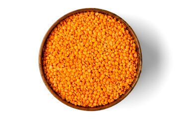 Raw seeds of orange lentils in wooden bowl, spoon isolated on white background Top view Flat lay Healthy eating, vegetable protein concept Traditional Turkish food