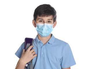 Boy wearing protective mask and backpack on white background. Child safety