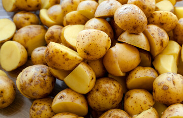 Chichty new potato slices on a baking sheet