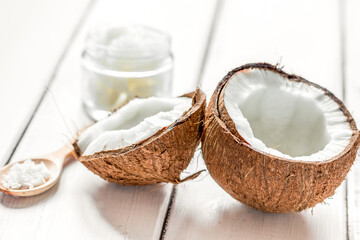 Fototapeta na wymiar organic cosmetics concept with coconut on table background