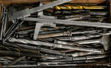 A set of metal tools in the workshop on an old rustic wooden background.concept.Father's day or labor day holiday