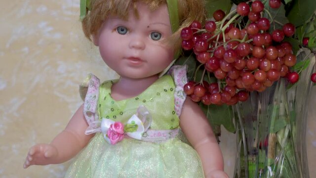 doll with viburnum,beautiful doll with viburnum berries