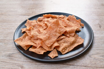 baked crispy pork Thai salty snack on plate