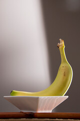 Banana in a clear glass bowl