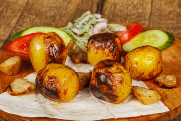 Caucasian traditional Potato shashlik with fat