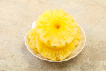 Sweet pineapple rings in the bowl