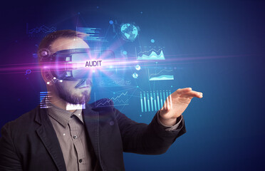 Businessman looking through Virtual Reality glasses