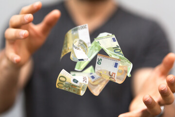 money euro banknote in hand rain - obrazy, fototapety, plakaty