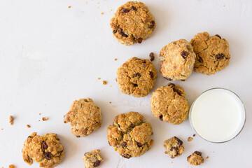 oatmeal cookies and milk on a white background. healthy food for baby breakfast