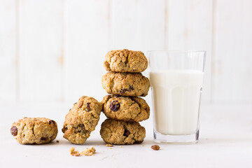 oatmeal cookies and milk on a white background. healthy food for baby breakfast