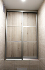 Wardrobe with sliding doors. Furniture. Interior design. 