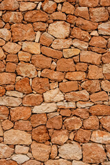 texture of a old red stone wall mediterrranean spain architecture, wall background	